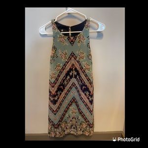 Small patterned dress with attachable gold necklace